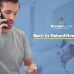 Man on Phone Calling About Sick Child in Bed